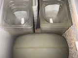 two containers in the back of a refrigerator filled with food