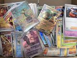 a box full of pokemon cards sitting on a table