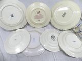 many plates that are sitting on a table