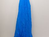 a blue dress hanging on a hanger on a wall