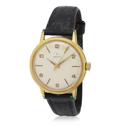 a close up of a wrist watch on a white background