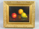 un tableau représentant deux poires et une orange posées sur une table