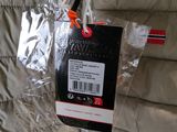a bag with a pair of scissors hanging from a hook