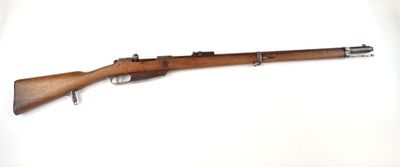 un fusil avec un canon en bois sur fond blanc