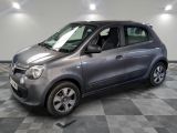 a picture of a small car that is parked in a garage
