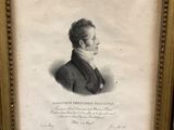 an old picture of a man in a suit and tie in a gold frame