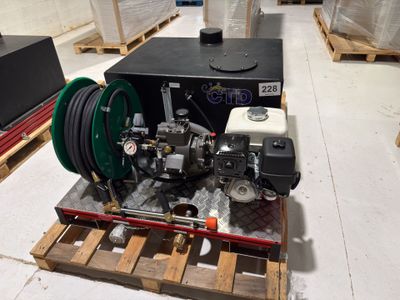 a picture of a water pump on a pallet in a warehouse