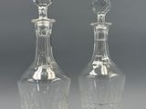 pair of cut crystal decanters with stoppers