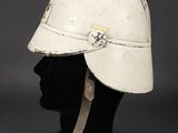 a close up of a helmet on a mannequin head