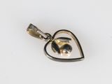 an image of a silver heart shaped pendant with a black and gold bead