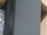 a box with a laptop inside of it sitting on a table