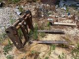 a rusted gate that has been placed on the ground