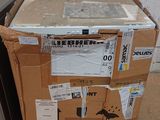 a microwave sitting on top of a pallet next to a microwave oven