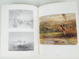 a book with a picture of a landscape and a picture of a boat