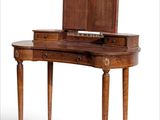 an image of a wooden vanity with a mirror on it