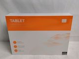a close up of a box of a tablet on a white surface