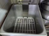 an image of a commercial kitchen with a deep fryer