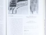 a book with a picture of a chair and a table