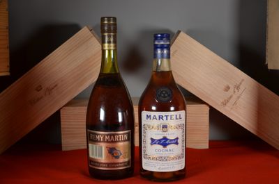 two bottles of wine sitting next to each other on a table
