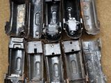 a lot of metal parts that are on the floor