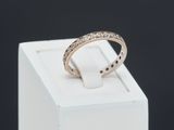 a close up of a white box with a ring on it
