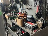a workbench with a lot of tools on it