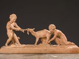 an image of a statue of a boy and a girl feeding a goat