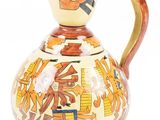 an image of a vase with a bird on it