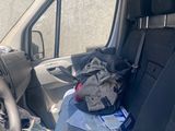 a car with a bunch of items in the back of it