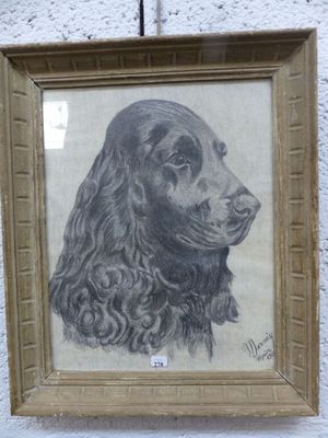 dessin d'un chien dans un cadre accroché au mur