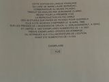 the back cover of a book with a picture of a cat on it