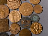 many different types of coins on the table