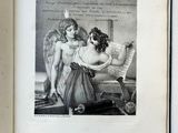an open book with a drawing of two women sitting on a couch