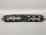 a close up of a toy train on a white surface
