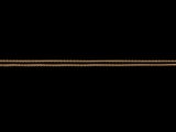 an image of a close up of a metal object on a black background