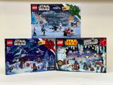 Trois coffrets Lego Star Wars sont présentés sur une surface blanche