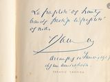 a book with a handwritten quote on it