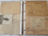 an open book with a lot of old papers inside of it