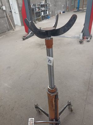 an image of a hockey stick on a stand in a garage