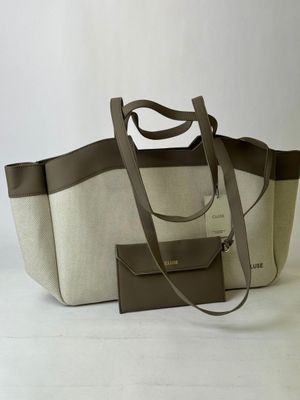 beige and brown canvas tote bag with matching wallet and tag