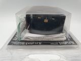 a plastic box that has a black purse inside of it
