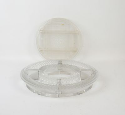 a clear plastic container with a lid on a white surface