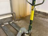 a hand truck that is sitting in a room