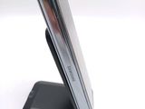 a close up of a cell phone on a stand