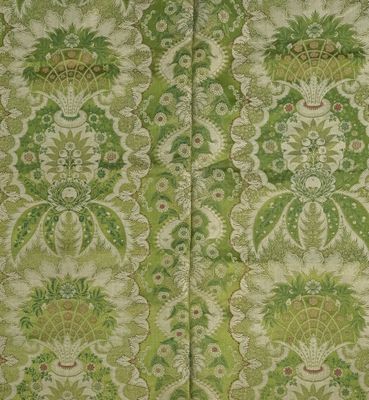 an image of a close up of a green and white wallpaper