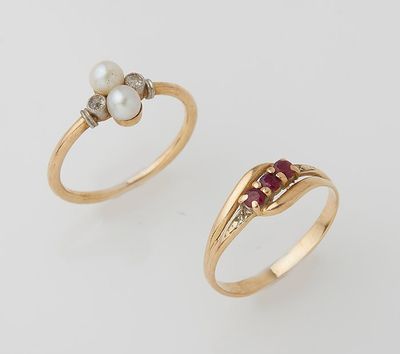 two gold rings with pearls and diamonds