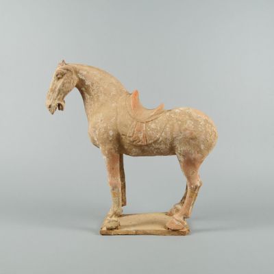 statue of a horse with a saddle on it ' s back