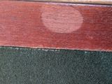 a close up of a piece of wood with a hole in it