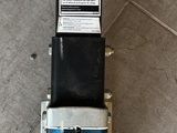 an image of a parking meter on the ground