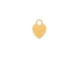 a small gold heart charm on a white background